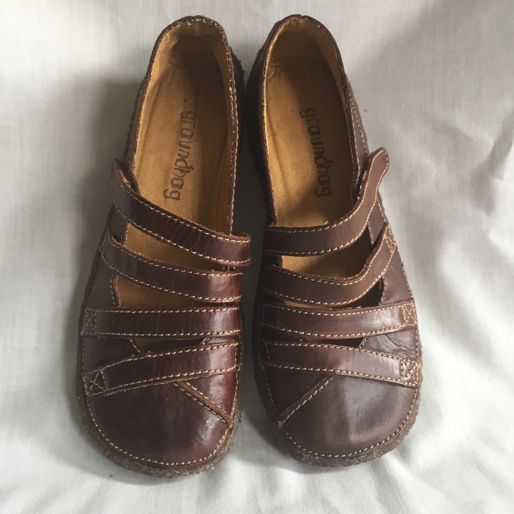 Groundhog loafer type shoes. Velcro close strap